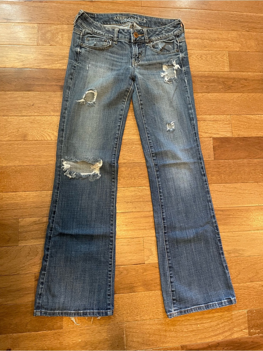 American Eagle Outfitters Distressed Bootcut Jeans - Medium Blue Size 4